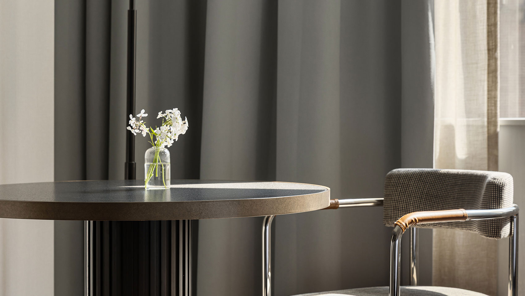 Monaco Seattle Guestroom desk with vase and flowers