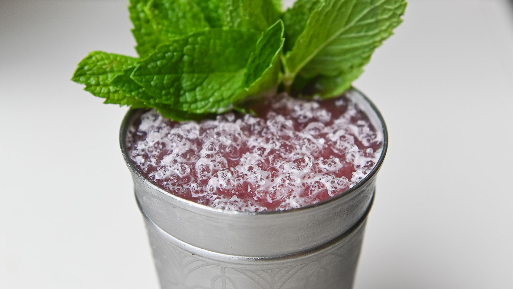 garnished Marin cocktail in silver cup